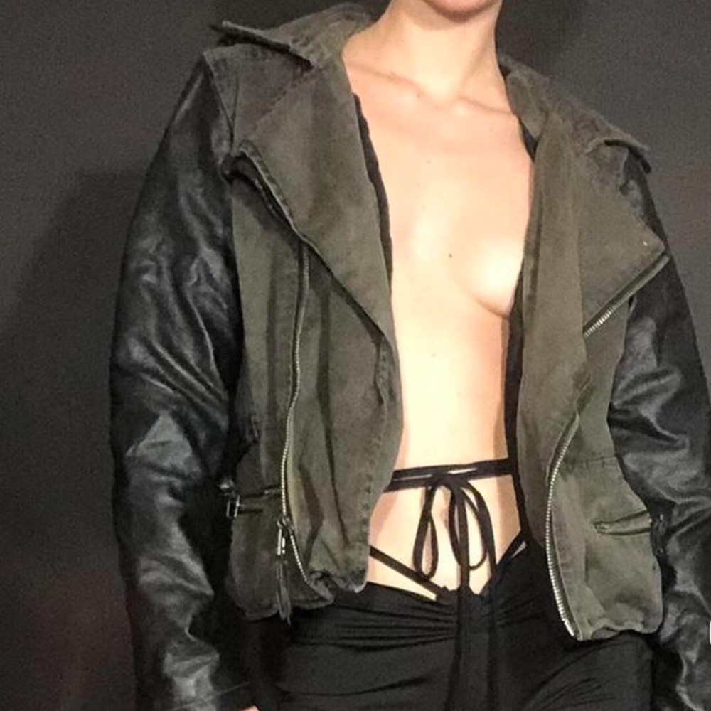 army green and black leather jacket